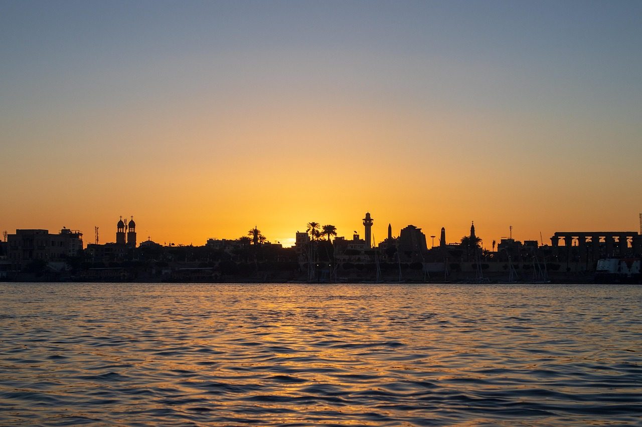 Luxor Temple at sunset along the Nile River