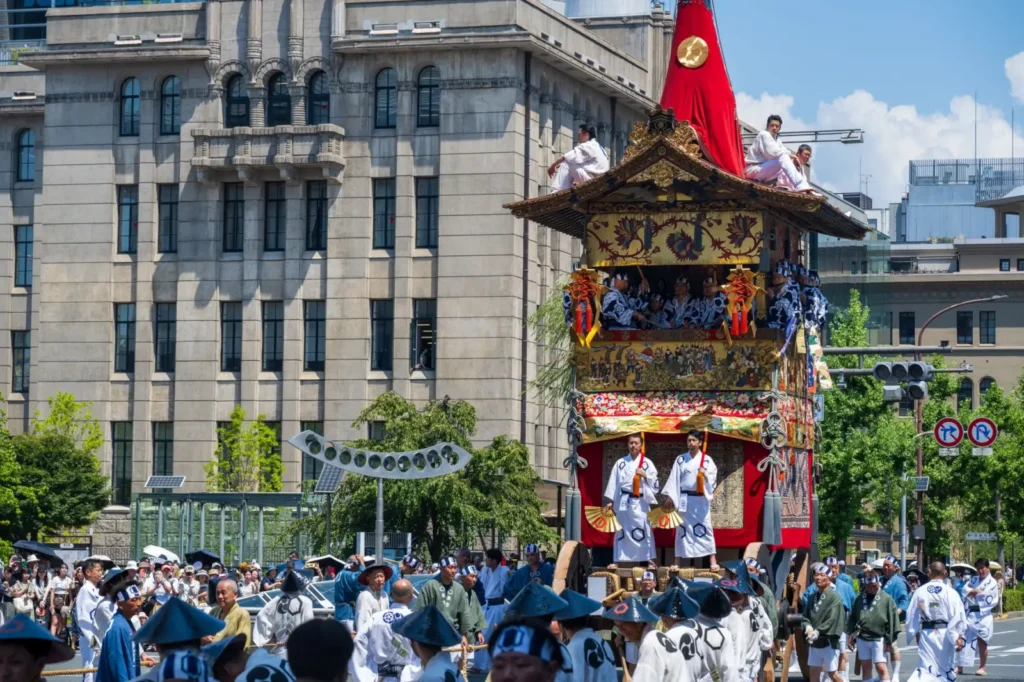Colorful floats and traditional costumes in the Gion Matsuri parade, Kyoto