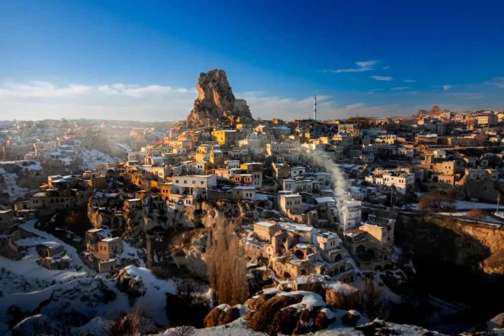 Fairy chimneys of Göreme at sunrise, capturing the surreal landscape carved by volcanic eruptions